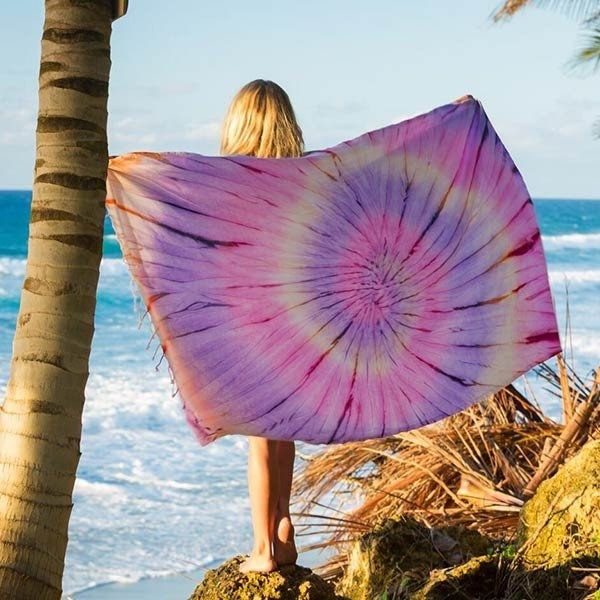 Sand Cloud Towels come in tons of cute colors and prints, and some even fit up to 3 beach lovers at a time. Plus, they donate 10% of sales to protect and preserve marine life.
