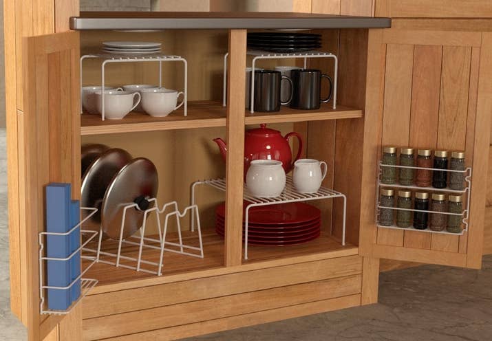Get a six-piece set from Amazon for $16.03.Promising review: "I love how organized my shelf is now! It fits in perfectly and is very sturdy. Getting six pieces for less than $5 each is amazing. I put pans and lids, plates, spices, and saran wraps, and I used one of the racks for organizing my coffee stuff." —Barbara