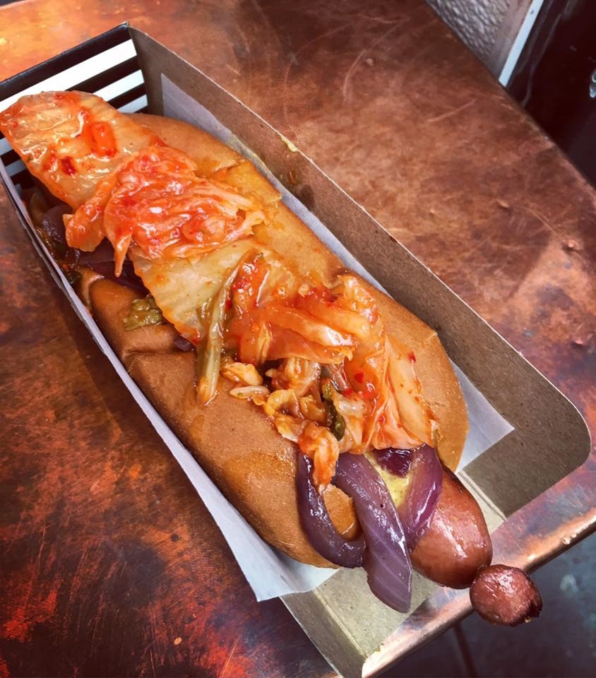 SnackBox specializes in custom-made all beef hot dogs topped with some of the most unique toppings, sauces, and condiments. Made with natural casings, the hot dogs are lightly smoked and seasoned to create a well rounded unique flavor. The K Town, pictured above, is topped with kimchi, onions, and mustard for a fusion of Asian and American flavors.
