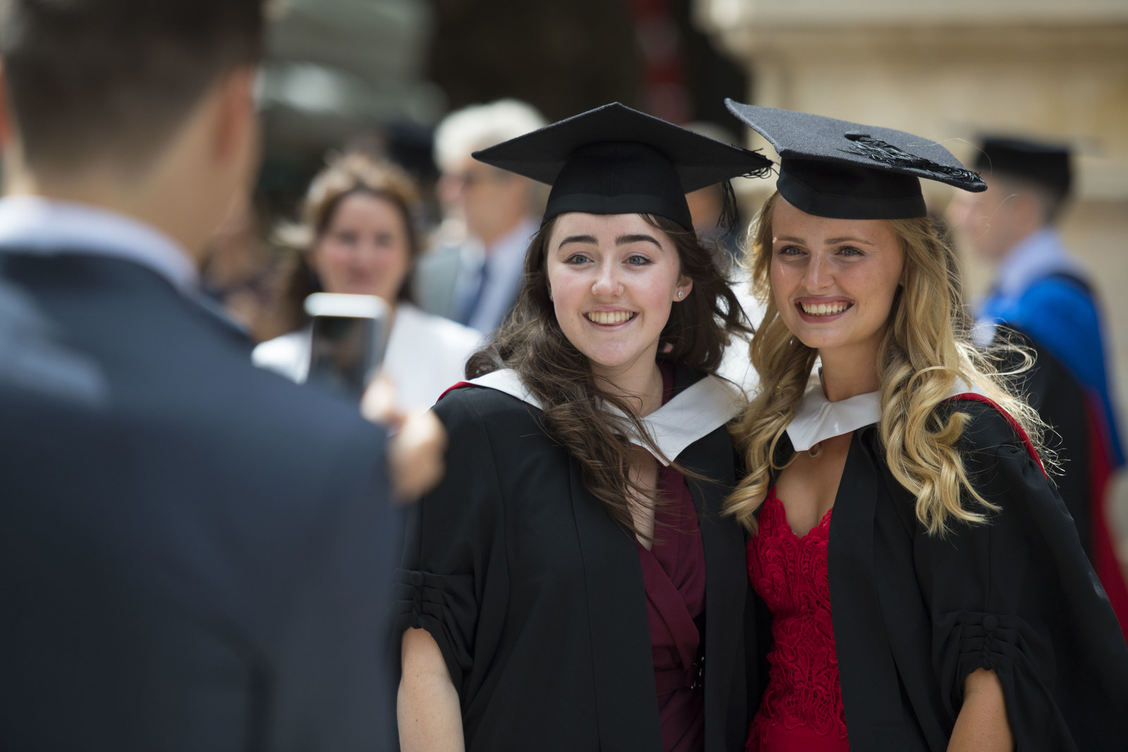 The first thing you need to do is find out where and when your graduation will take place. Graduating students should try to be seated around 1 hour before your ceremony begins. Be there with plenty of time to spare, you don’t want to be that person who walks in late!Print out the confirmation email sent to you by Ede and Ravenscroft to collect your robes with ease at the ceremony. If you haven’t purchased extra time with your gown, it is important to return them the same day. Graduation robes can be returned as soon as the ceremony finishes. The return windows change between graduation times, so make sure to double check with the staff present to avoid fines.Leave your house a little early, it can be stressful trying to get yourself and family to the venue on time, as well as collecting your registration card, tickets and academic dress. Make sure to get lots of photos with your friends and family, you're unlikely to graduate again - savour the moment! Once you’re decorated with a cap and gown, it’s a good idea to introduce your family to your friends and their families. Your parents will probably be more excited about the day than you are. Instead of getting embarrassed and shooing them away, embrace the moment, hug them back, be humble and laugh it off if you have to.