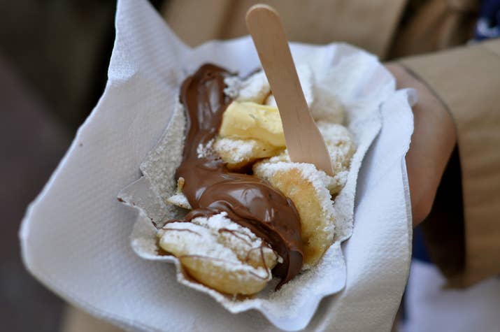 They're baby pancakes usually served with anything from syrup and butter to chocolate sauce and powdered sugar.
