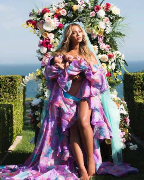 Like a thief in the night, Bey took to Instagram around 1:00 A.M. EST and snatched all of our wigs with this gorgeous photo holding her precious newborns.