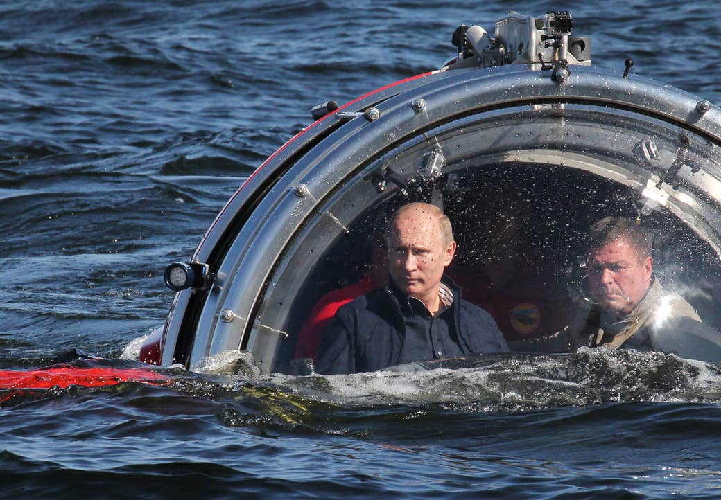 Putin rides in a submersible in the Baltic Sea near Gotland island on July 15, 2013. The vessel dived to the sea floor to explore a sunken ship in the Gulf of Finland.