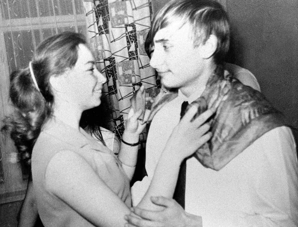 Putin dances with a classmate during a party in St. Petersburg in 1970.