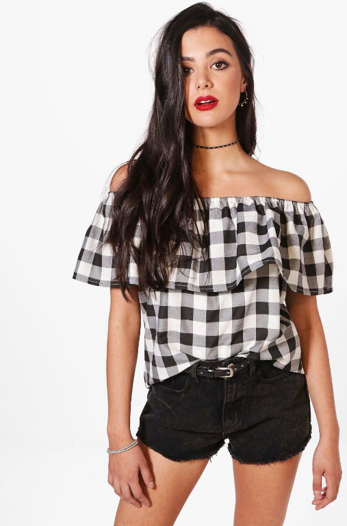 Keep an elastic off-the-shoulder top (like this one) from slipping up when you raise your arms with four safety pins and two hair ties.