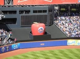 When you think of the city that never sleeps, kitsch is something that never comes to mind. A Route 66 road trip yes, but New York City? Never. But that is what you get when a Met parks one over the fence for a four-bagger. A gigantic apple rises over the outfield wall sporting the New York Mets logo. It is reminiscence of those giant muffler men and other large chicken wire and tin creatures that dot the lesser traveled byways of America. That apple has a storied history. The concept originated in 1980 at the Met's former ballpark, Shea Stadium. Once Citi Field replaced Shea, a newer bigger apple was designed with sophisticated hydraulics to ensure it rises and retracts smoothly. The McIntosh-red apple is 18 feet in diameter and 16 ½ tall weighing in at 4,800 pounds, giving new meaning to “the Big Apple.”What happened to its smaller and less high-tech predecessor from Shea Stadium? It was to be abandoned and demolished, but when Mets' executives polled fans about which item from Shea should be part of Citi Field, 92% mentioned the apple as their fist choice. Fans saved the fruit from the juicer and it now sits proudly outside of the new ballpark.
