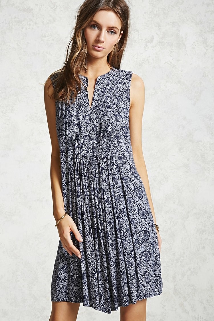 Summer internship? Starting a new job in the Fall? Pair this smocked bodice dress front with a chunky belt for a professional and chic look.