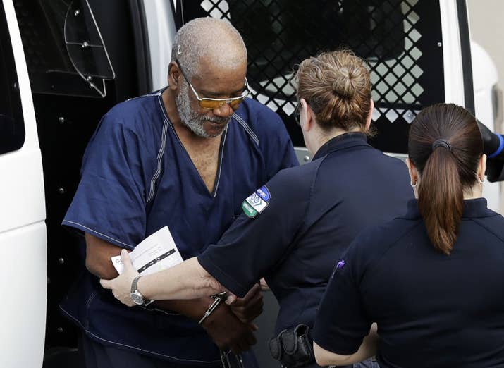 James Mathew Bradley Jr. (left) arrives at the federal courthouse for a hearing on Monday.