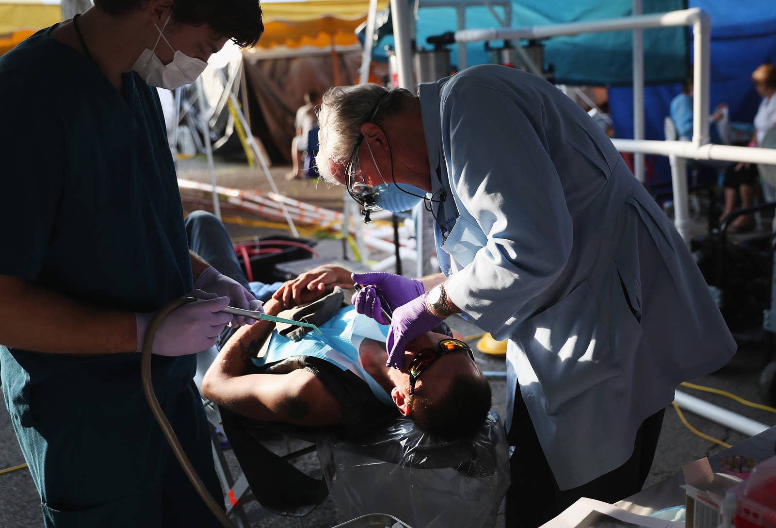 A patient receives medical care from onsite dentists in Wise on July 21.