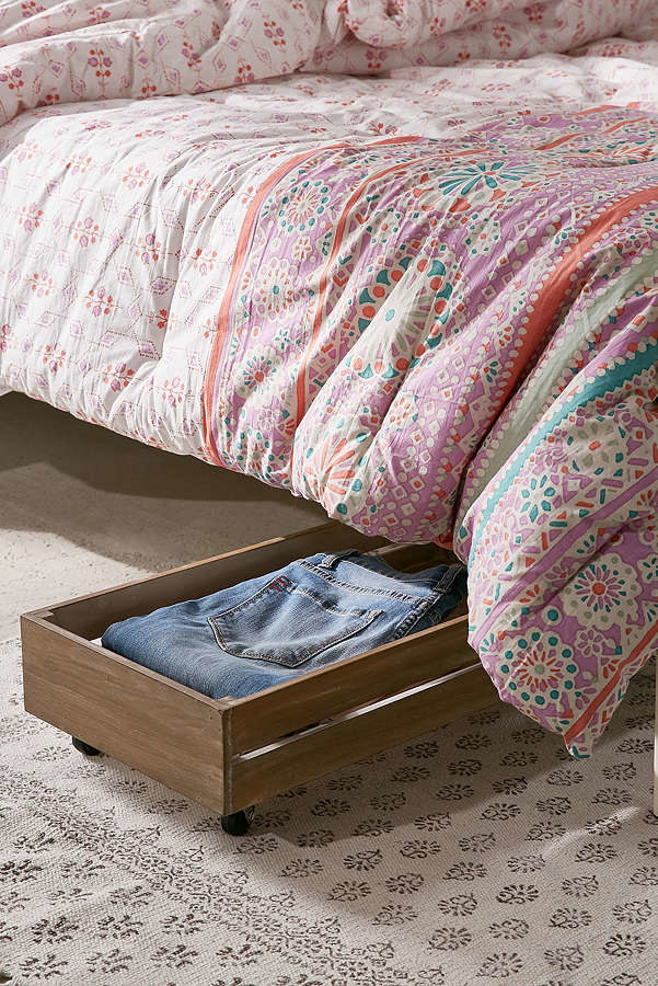 Get the shelves on Urban Outfitters for $59 and bed risers on Amazon for $18.99.You can always cover it all with a dust ruffle.