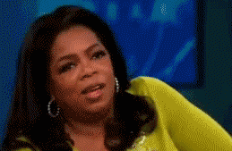 Close-up of Oprah shaking her head no
