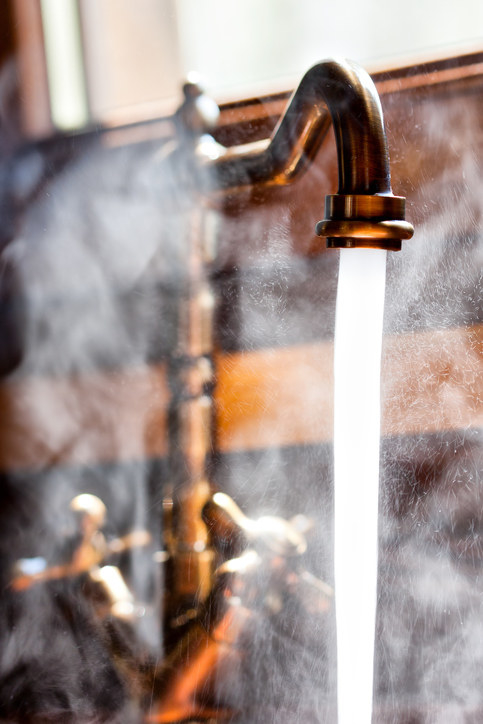 Close-up of water coming from a faucet