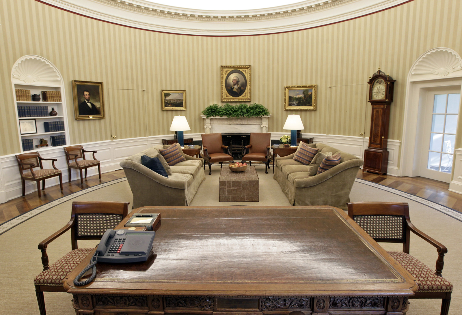 The Oval Office periodically undergoes changes to its carpet, couches, drap...