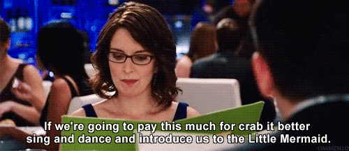 It's just rude to order a $100 filet mignon when you're not paying for yourself. Even if the person treating is independently wealthy, it will still go a long way for you to not order the absolute most expensive thing on the menu. If the person paying wants to order for you, then it's totally fine that they order the most expensive thing. But you should use discretion when someone invites you out.
