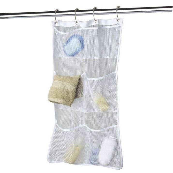 Promising review: "Our family chose to get one of these versus the shower holders that attach to the head. I'm SO GLAD I got this. Ours has face wash in the top pockets, body wash and shaving cream (with razor) in the middle, and shampoo and conditioner in the bottom pockets. If you get oversize shampoo/conditioner, it might not hold as well. In my opinion, even with all these things, and heavier items at that, the pockets are easy to get in and out of." —SLKGet it from Amazon for $7.99.