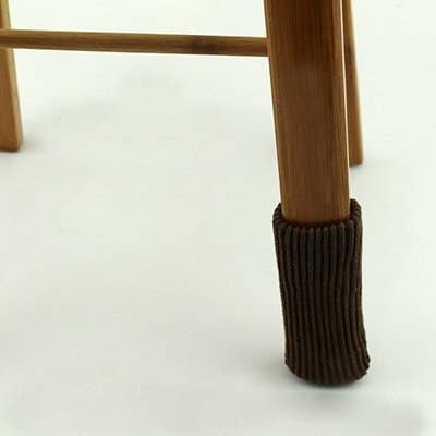 Promising review: "I used to use those slider things on my chairs that sit on a wood floor. They would often fall off or make the chairs uneven. Not so with these wonderful socks. They stay put and protect the floor. Moving the chairs is now a silent operation. An added benefit...they attract the cat hair and I can just pick it off once a week, which is easier than chasing the stuff around the dining room with a dust mop." —Constance RadcliffeGet a 24-piece set from Amazon for $8.67 (available in black and brown).