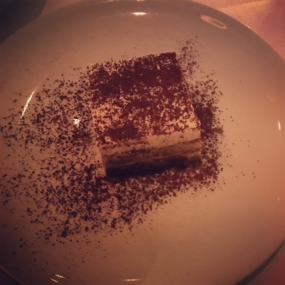 An italian classic, the Tiramisu at MAMO features layers of coffee-soaked ladyfingers with whipped cream and flavored with cocoa powder.
