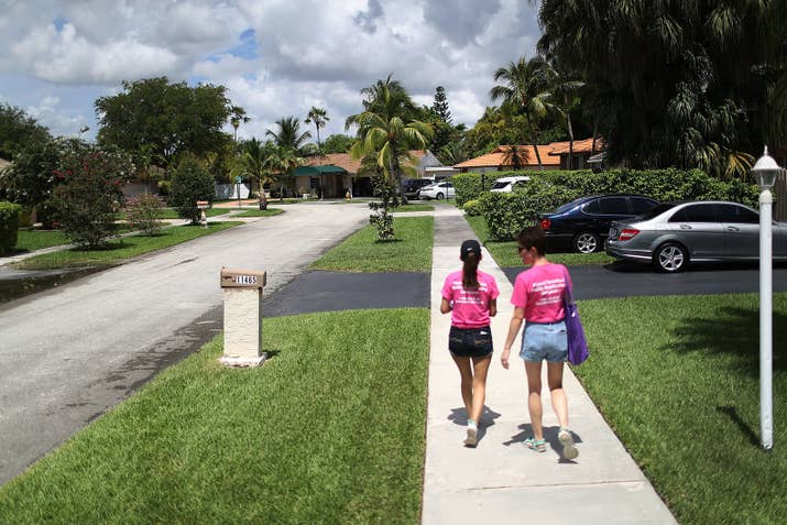 Planned Parenthood canvassers go door to door about the Zika virus in Florida last month.