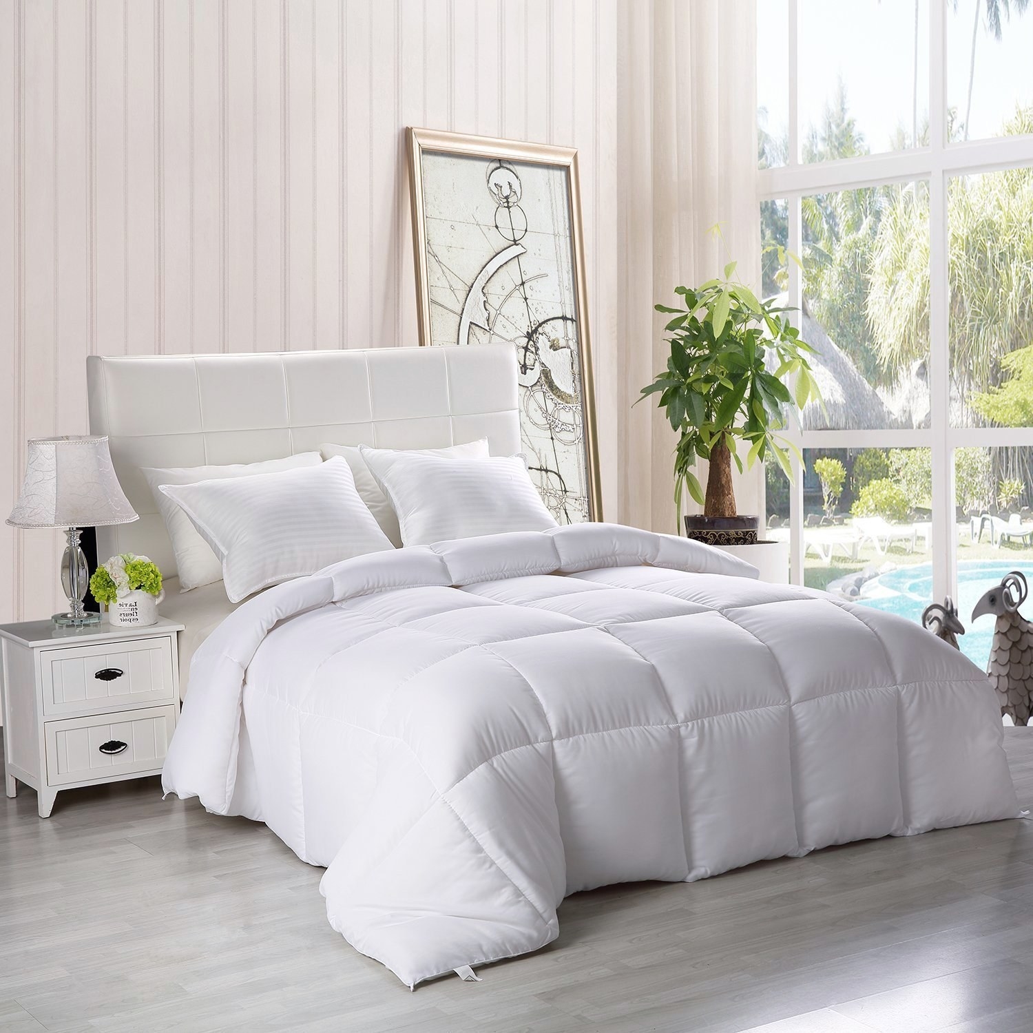 White comforter on mattress in bedroom