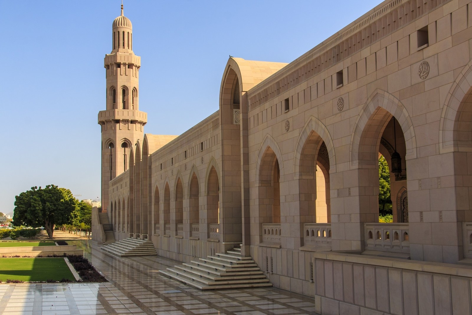 Begin your Muscat city tour at the Sultan Qaboos Grand Mosque. A place of worship built across a vast area, this mosque was completed in 2001. With a capacity to accommodate over 20,000 worshippers, the Sultan Qaboos Grand Mosque is considered as one of the largest mosques in the world. Consisting of a spacious men’s prayer hall located adjacent to the women’s prayer hall, this iconic landmark is found close to popular accommodation options in the area such as Al Falaj Hotel.