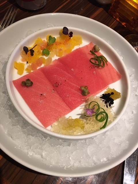 For a starter, try the Tuna Carpaccio. Served cold on a bed of ice, the thinly-sliced, fresh tuna is paired with lime caviar and grapefruit orange pearls with fresh citrus and sea salt.