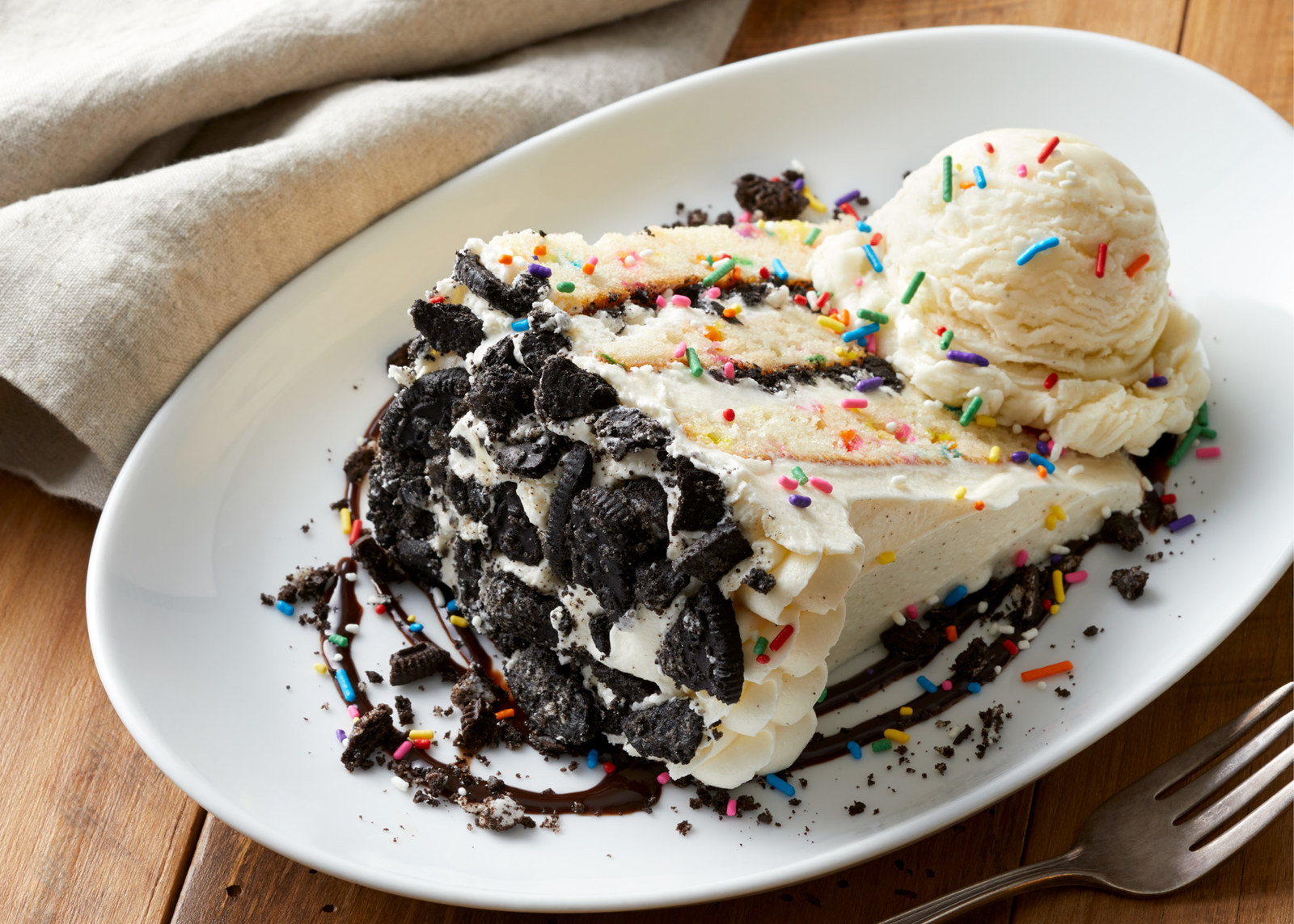 A birthday celebration wouldn't be complete without a birthday cake. To end your meal on a sweet note, indulge in a slice of Cookies and Cream Confetti Cake, which layers vanilla confetti cake with a chocolate cookie cream and vanilla bean gelato.