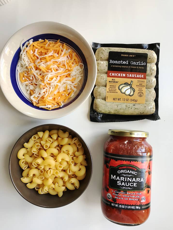 Pasta + pre-cooked chicken sausage + tomato sauce + shredded cheese.