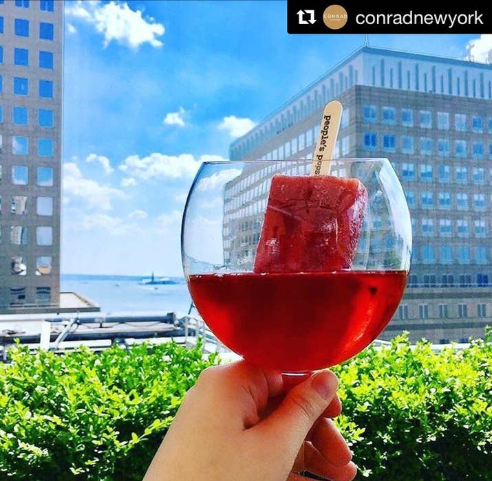 Loopy Doopy Rooftop Bar located in the Conrad Hotel in NY, New York does a Prosecco or Rosécco that starts as your base for you wine cocktail and then you pick from five different homemade Popsicle's. The one that sounds the best to me is the Strawberry, Rose Water, and Gin popsicle. 