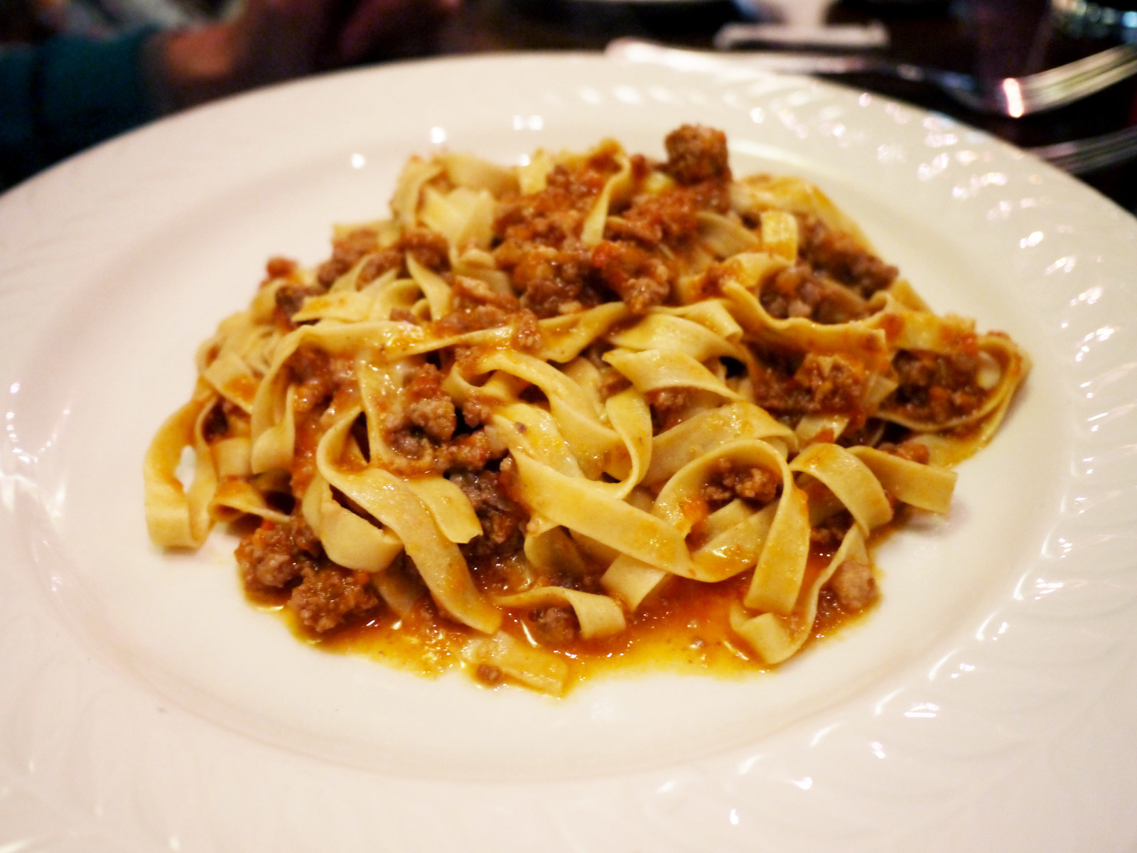 it's a traditional recipe from Emilia-Romagna, with onion, beef meat, bacon, white wine, tomato sauce, olive oil and salt.