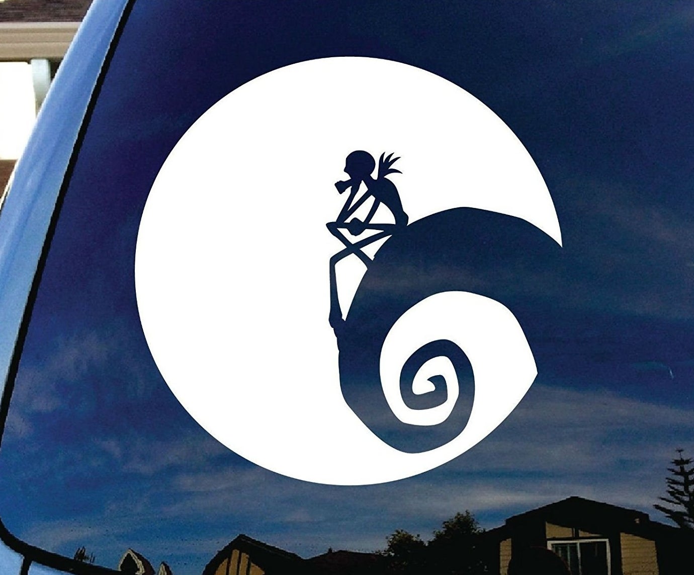 sticker of jack skellington sitting on his curly mountain 