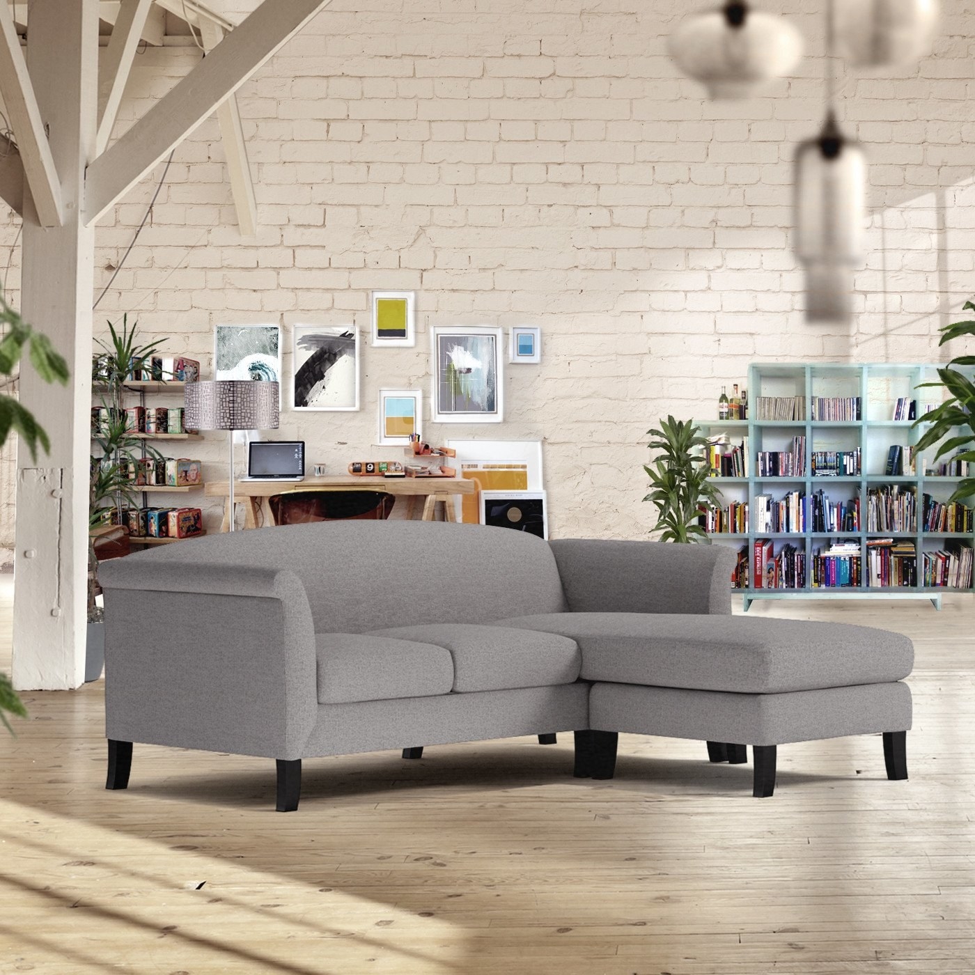 The gray sectional on display with home furnishings behind it