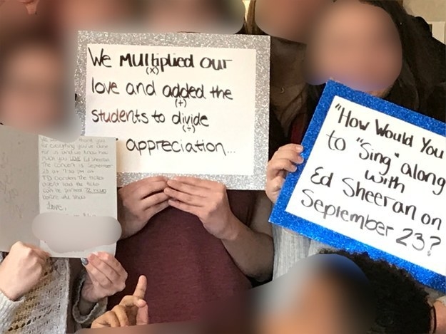 buzzfeed community user&#x27;s class, faces blurred out, holding signs announcing they gifted the user tickets