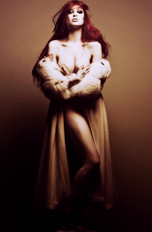 Porcelain Black - fierce Detroit siren, whose industrial-pop musical style spans Marilyn Manson to Britney Spears. She even rocked a Cruella de Ville hairstyle for a hot minute, I mean how apropos can you get I mean really