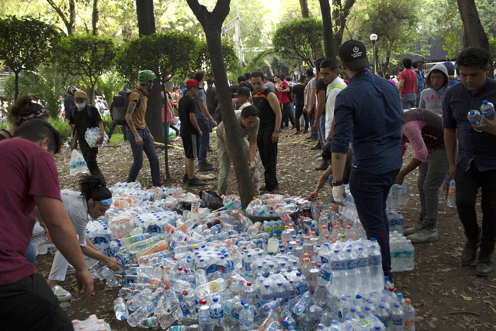 Bottled water is distributed to rescuers and victims in Mexico City.