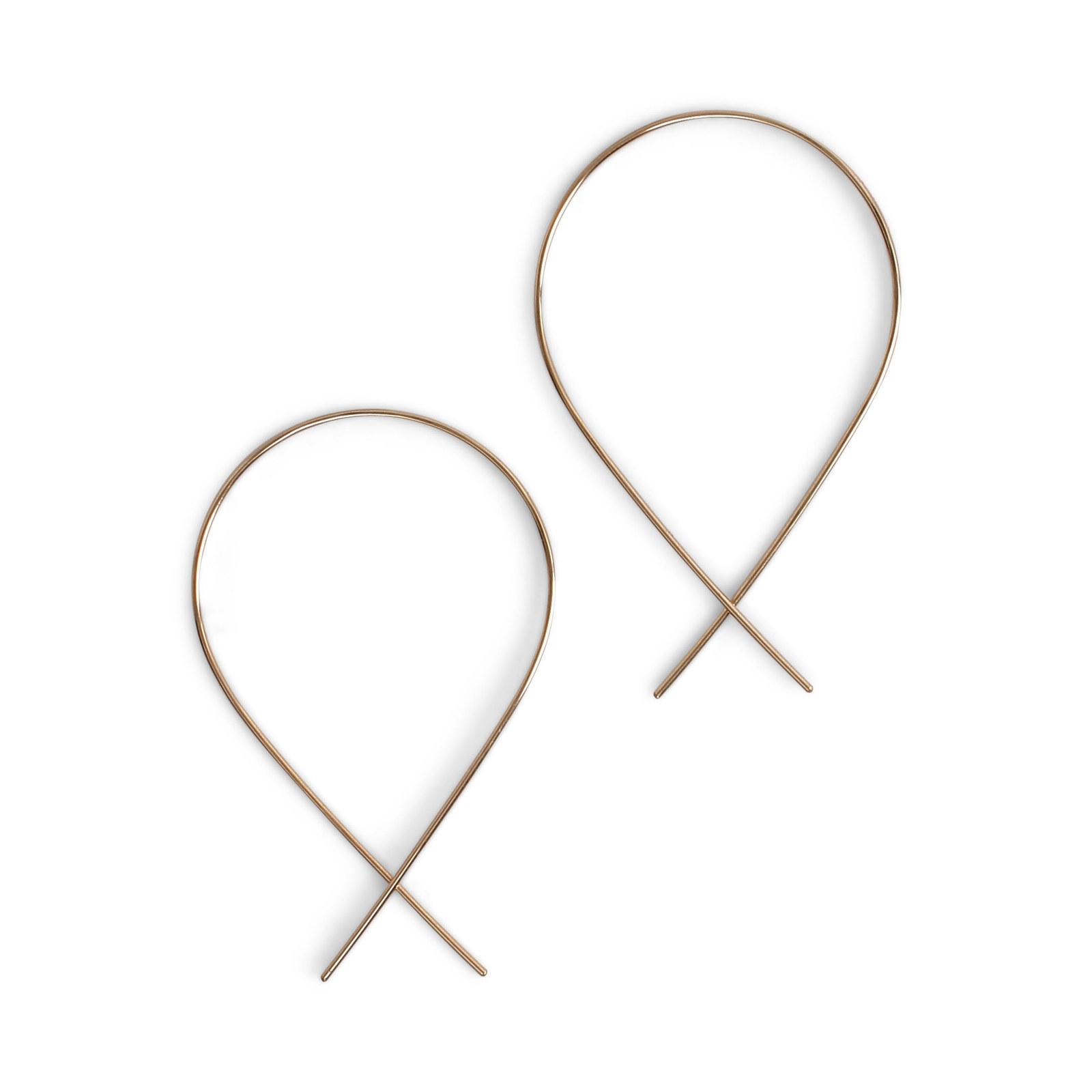 With the mission of providing quality, handmade jewelry at accessible price points, fail specializes in pieces that are delicately handcrafted in 14K gold-fill, sterling silver, or brass. A perfect modern alternative to the hoop, the classic Fish earrings boasts a casual vibe and unique design. These delicate threader earrings feature 14K gold-fill shaped into a continuous, open hoop for an effortless look. With understated elegance, these artistic alternatives are the perfect addition to a minimal collection.