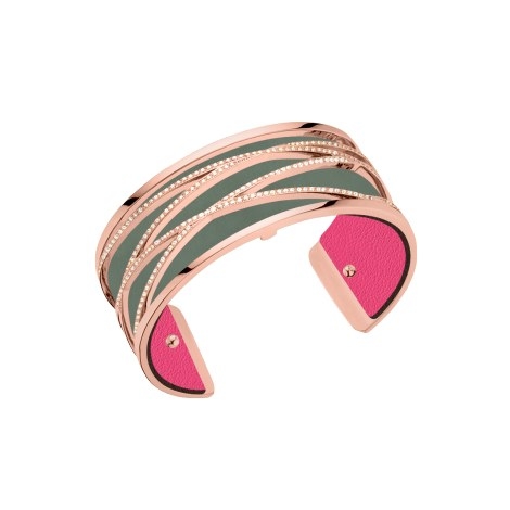 Les Georgettes by Altesse is an innovative French jewelry concept featuring interchangeable and reversible colored bands. Les Georgettes by Altesse brings together the finest in jewelry and leather craftsmanship. The cuff bracelet, inset with cubic zirconia and rose gold finish, is a chic and refined piece that can be worn with its reversible leather band - choose between Fuchsia or Khaki to go with your daytime or evening looks.