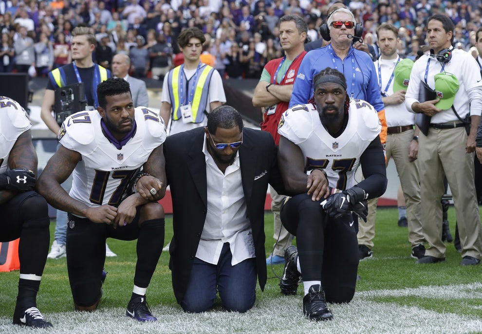 Cincinnati Bengals locked arms during the national anthem