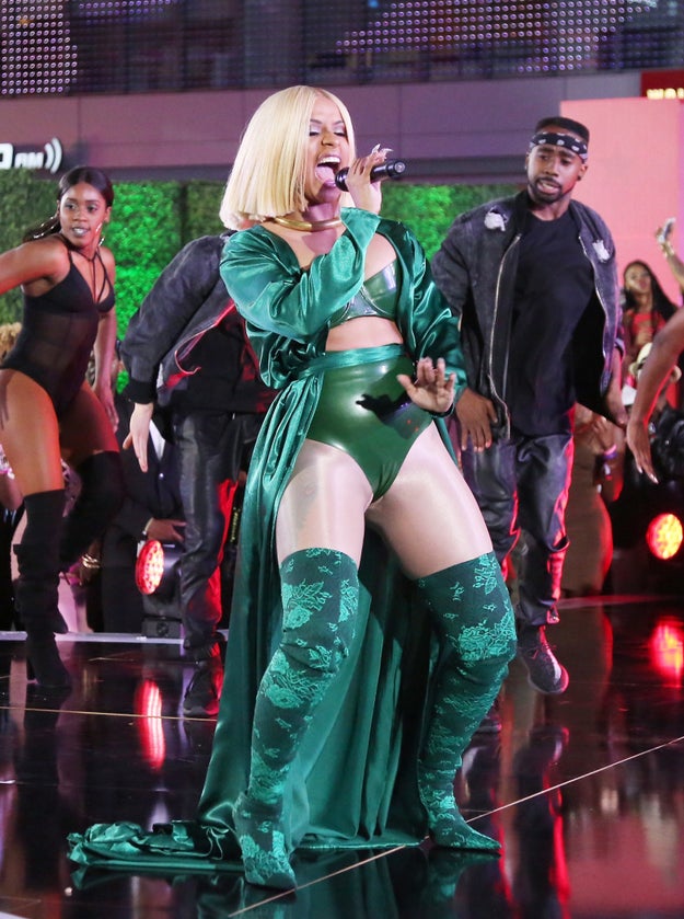 But the time she pulled off head-to-toe money green silk and latex? GIVE THIS WOMAN A RAISE, ALREADY!!!