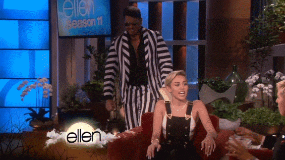 A Robin Thicke look-a-like rattling Miley Cyrus.
