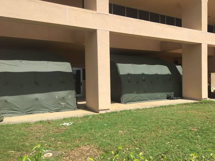 Army tents awaiting patients outside Schneider Regional