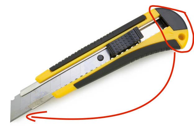 Here's what the non-sharp side can do: Utility knife blades often have perforated blades that can be snapped off when the cutting edge gets too dull. They also have a little slot on the very back of the handle that you can slip the blade into to snap it off cleanly and easily.