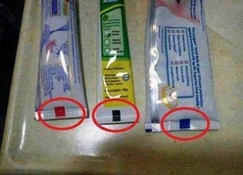 The explanation: These are called eye marks. On the production line, they allow optical sensors to recognize where a package needs to be cut, folded, or pressed. The color of the eye mark is largely irrelevant, it just needs to be dark enough for the sensors to see it easily.