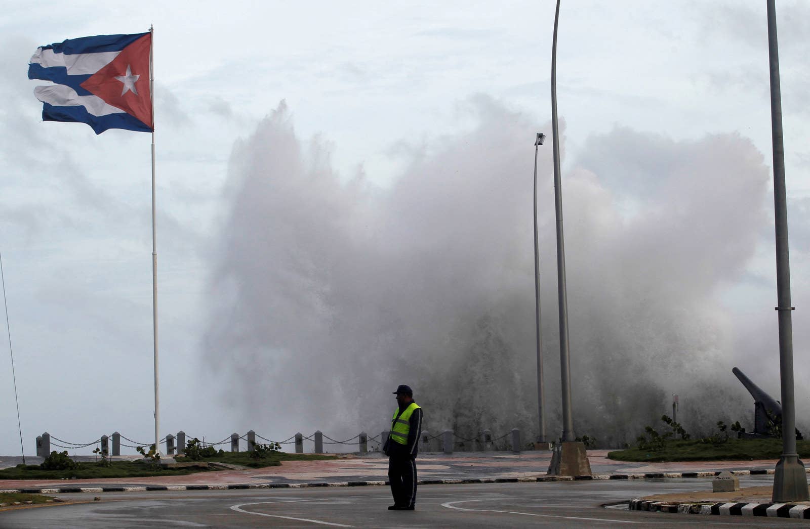 A wave slams into the Cuban coast.