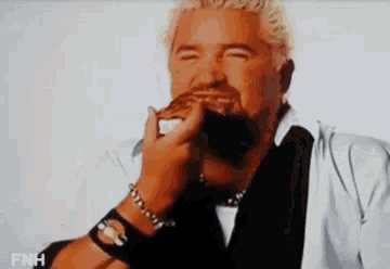 Everyone knows who Guy Fieri is, right? National treasure, Food Network host, restauranteur, Anthony Bourdain's archenemy, and lead singer of Smash Mouth.