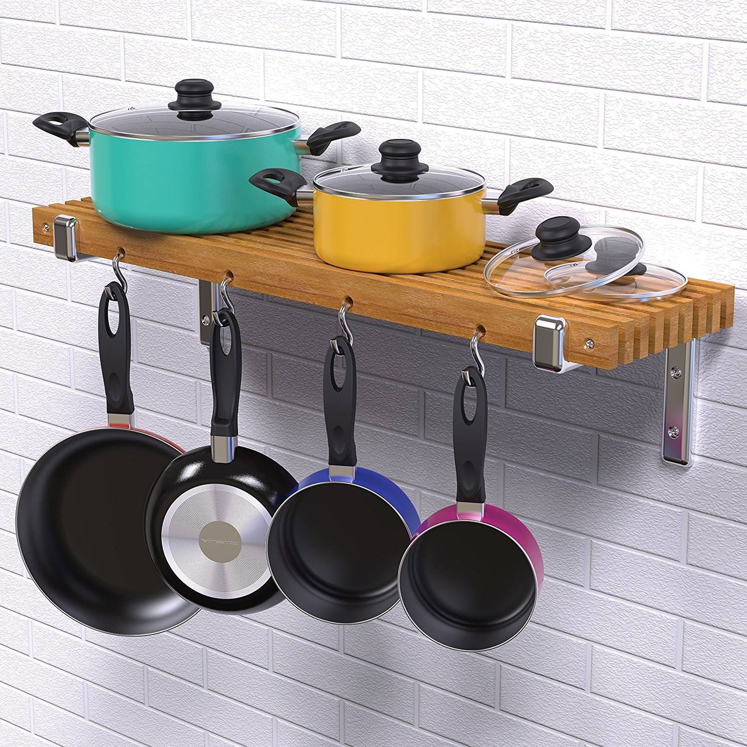 Promising review: "So far I really love this cooking set! They're all nonstick, and all of the saucepans have lids, which is perfect. It also comes with some utensils. I really love the bright colors. I would definitely recommend this to anyone who needs a variety of things when moving into a new place." —Kelly DickersonPrice: $44.99 Rating: 4.4 out of 5