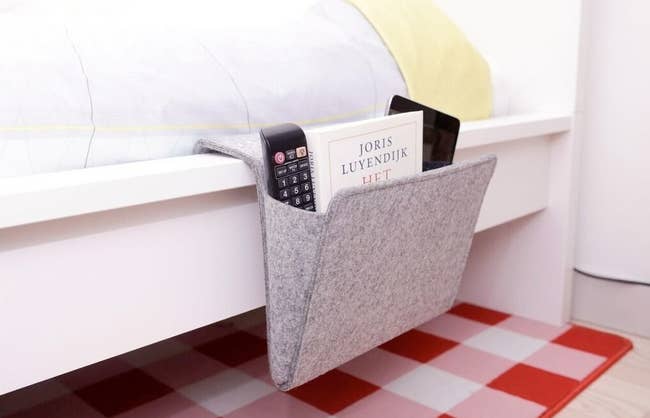 the bedside caddy with items inside