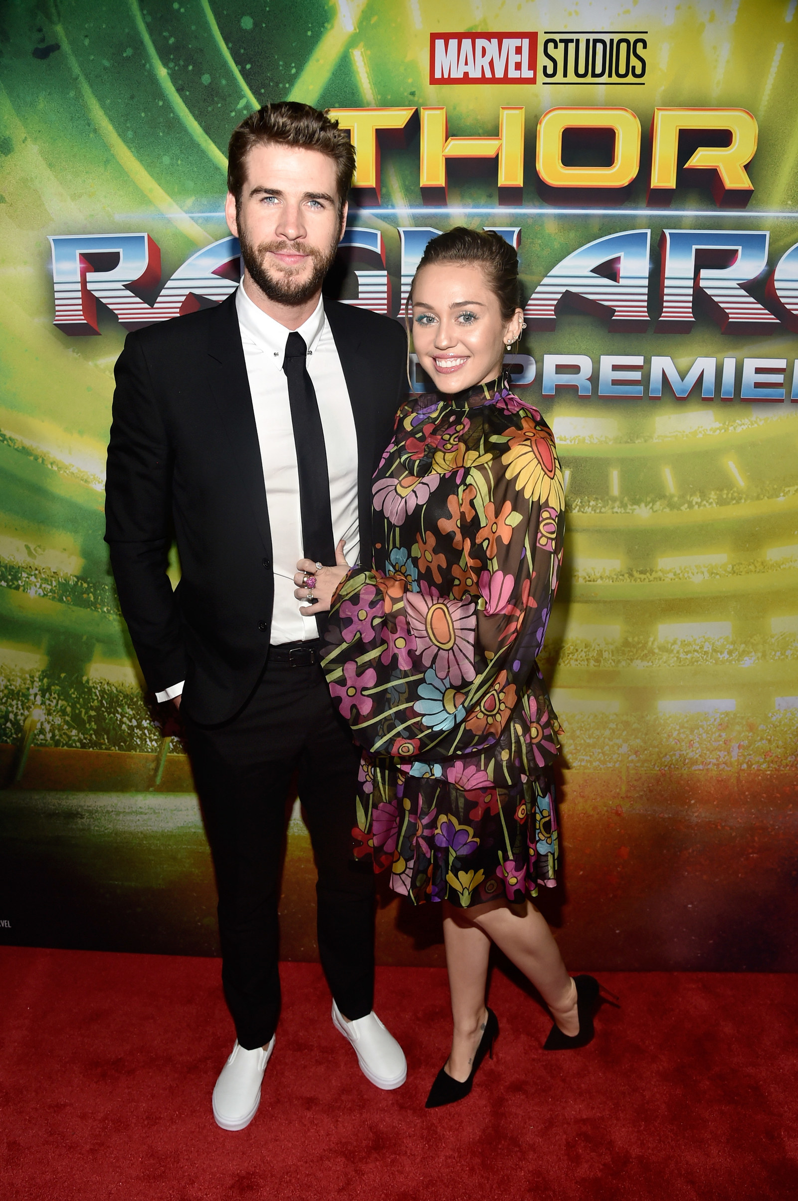 These Photos Of Miley Cyrus And Liam Hemsworth At The The "Thor