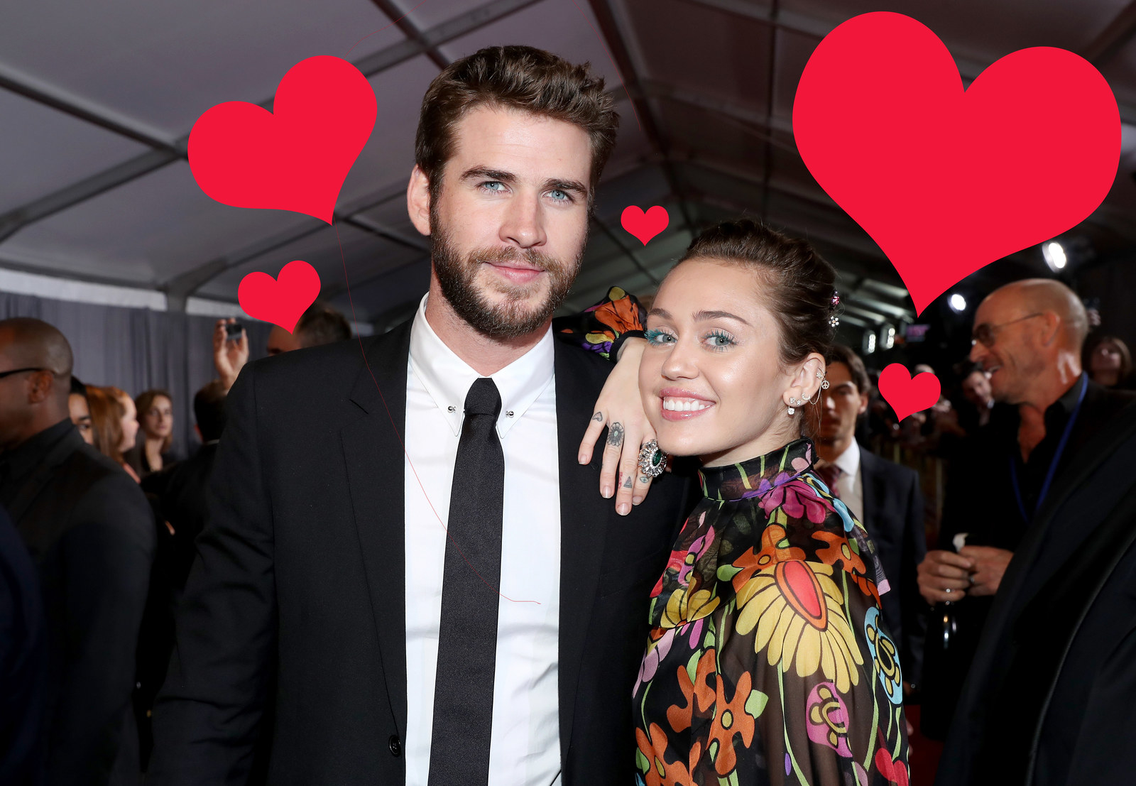 These Photos Of Miley Cyrus And Liam Hemsworth At The The "Thor