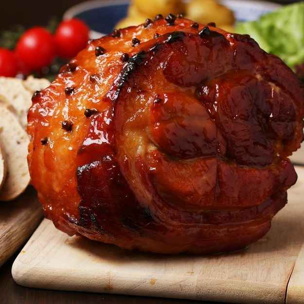 4 servingsINGREDIENTS1.7 kg (3 3/4 lb) gammon joint2 onion, quartered3 L (3 qt) pineapple juicePineapple Maple Glaze2 teaspoons dijon mustard125 mL (1/2 cup) pineapple juice125 mL (1/2 cup) maple syrup25 clovePREPARATION1. In a large pot place the gammon joint, onions and pineapple juice. Place over a high heat and bring to a boil.2. Once boiling reduce to a medium heat and simmer for 70 minutes. (Gammon joints need to cook for 40 minutes per kilo (2 1/4 lbs), so if you are using a smaller or large gammon joint change the cooking time accordingly.)3. Once cooked carefully remove the gammon joint from the pan and place on a roasting tin to cool slightly.4. Preheat the oven to 190°C (375°F)5. For the glaze, in a small pan over a medium heat place all the glaze ingredients. Stir and bring to a boil. Cook for 10 minutes or until slightly reduced and glossy.6. Next carefully remove the skin from the gammon joint, to aid this you can use a small knife to help ease the fat away from the skin. Be sure to leave a small layer of fat on top of the gammon.7. Score a diamond pattern on the fat and push a clove into each cross section.8. Liberally brush the gammon joint with the glaze making sure you have at least half left over.9. Place in the oven for 40 minutes glazing again half way through.10. Carve and serve.11. Enjoy!