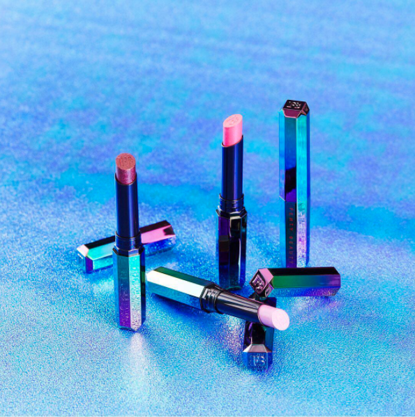 And since the first collection didn't have lipstick, we are SUPER hype that this one has four! The Starlit Hyper-Glitz shades have a shimmering chrome finish, but the formula is super creamy so you get sparkle without drying grit.
